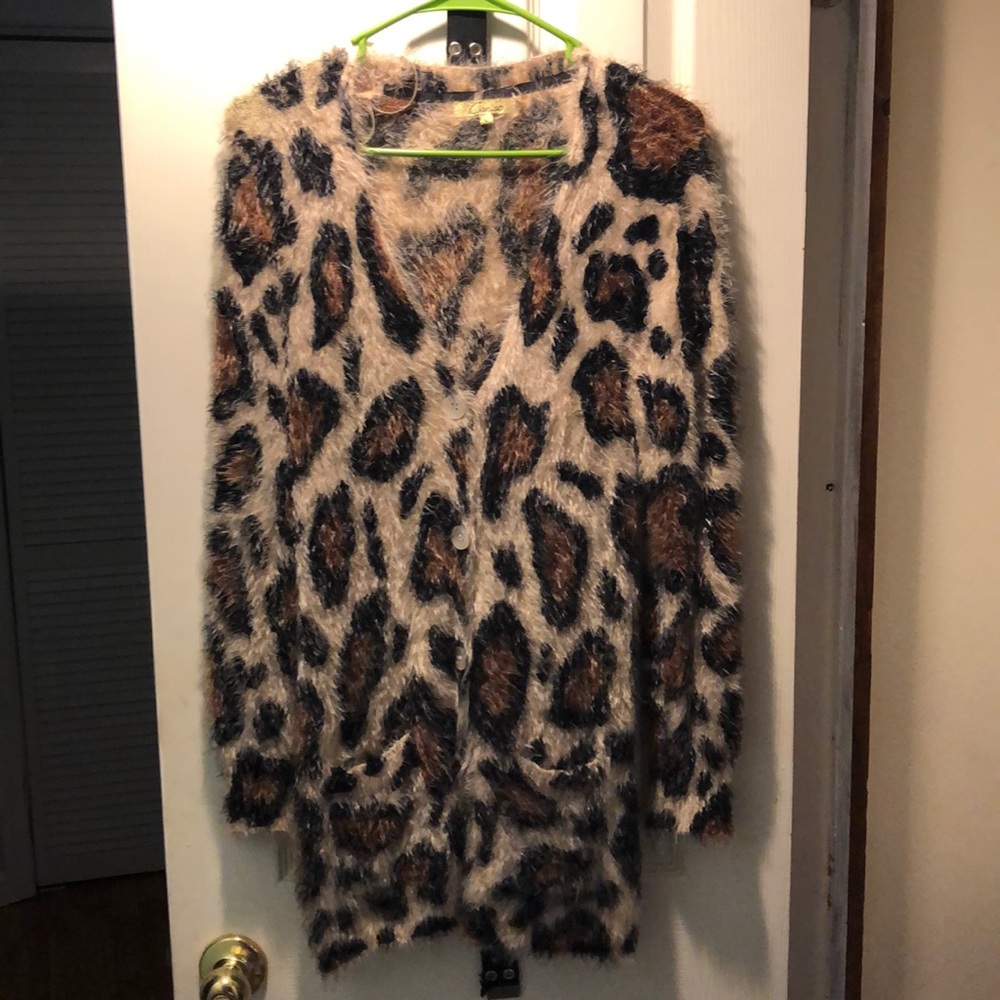 Fuzzy and stretchy cheetah print sweater
